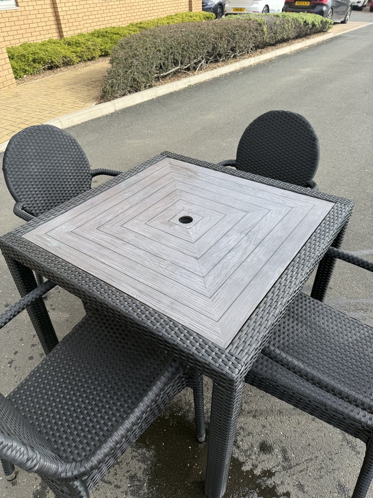 Molby 90cm Rattan Square Grey Polyresin Topped Table with 4 Molby Rattan Chairs – Black Weave